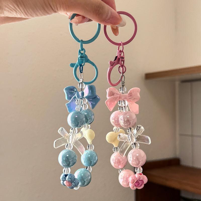 新作キャンディカラー ハートボウ ビーズ付き携帯電話チェーン - Phone Accessories For Teen Girls のレビューと価格